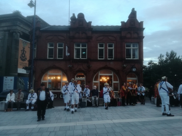 Getting Ready to Dance Outside "The Woodman"