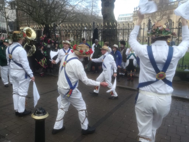 Dancing to keep warm by St. Phillip's Cathedral, Birmingham City Centre